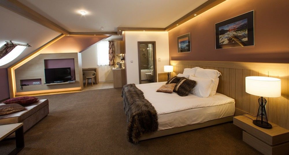 Amira Boutique Hotel Bansko Buitenkant foto A bedroom at the Hotel de la Poste