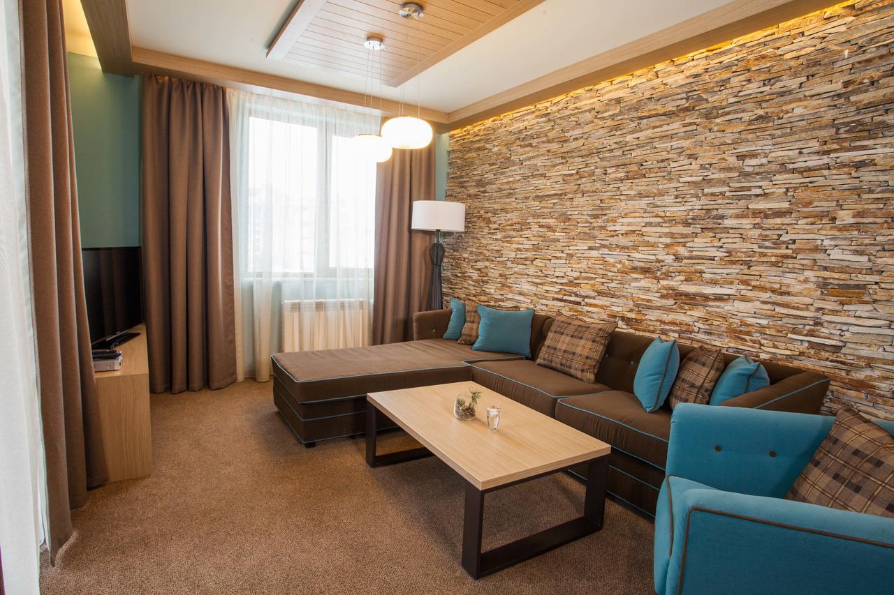 Amira Boutique Hotel Bansko Buitenkant foto A living room in a hotel